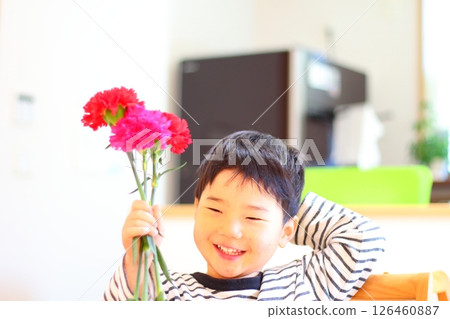 A boy with carnation A boy with carnation 126460887