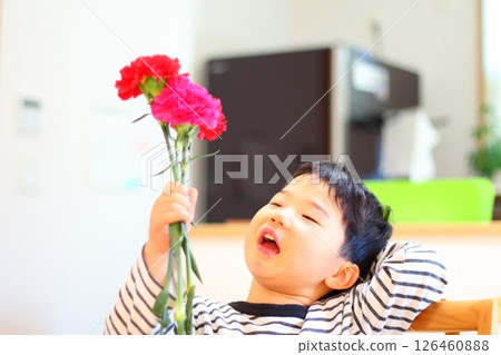 A boy with carnation A boy with carnation 126460888