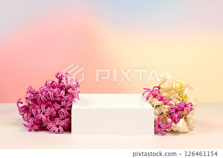 Creative template for your design.Empty product podium and spring flowers.Abstract flower arrangement with hyacinths, banner.Minimal modern aesthetics,elegant beauty concept 126461154
