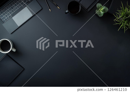 workplace for a man with a computer in dark shades 126461210