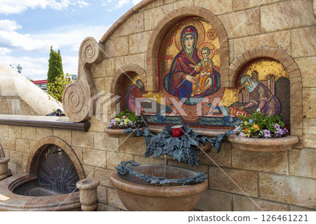 05.05.2025 - Minsk, Belarus. Pump with what to believed to be a holy water at church of all saints 05.05.2025 - Minsk, Belarus. Pump with what to believed to be a holy water at church of all saints 126461221