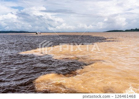 Meeting of the waters of the Negro and Solimoes rivers in the city of Manaus in Amazonia, Brazil 126461468