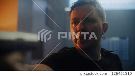 Male Criminal Breathing Heavily, Pointing the Gun, Talking to the Enemy Male Criminal Breathing Heavily, Pointing the Gun, Talking to the Enemy 126461510