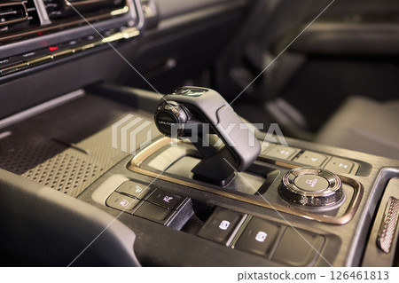 Macro shot of a car gear lever an essential auto part Macro shot of a car gear lever an essential auto part 126461813