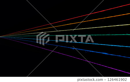 multicolored sewing threads in the form of a rainbow on a black background 126461902
