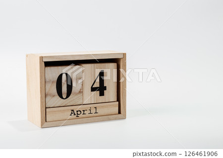 Wooden calendar April 04 on a white background 126461906