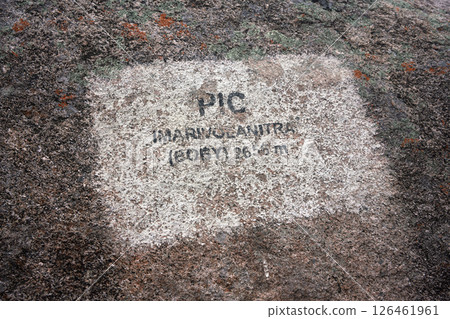 Sign at summit of Pic Boby aka. Imarivolanitra in Andringitra massif with altitude. This peak is highest accessible point on Madagascar 126461961