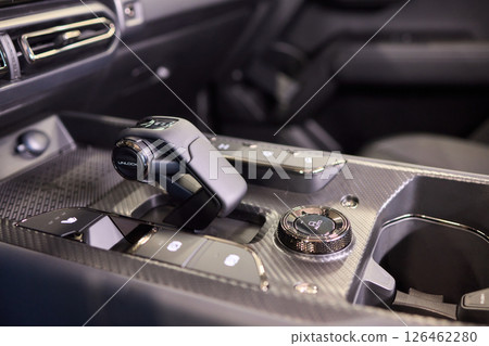 Macro shot of a car gear lever an essential auto part Macro shot of a car gear lever an essential auto part 126462280