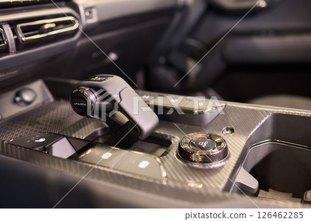 Macro shot of a car gear lever an essential auto part Macro shot of a car gear lever an essential auto part 126462285