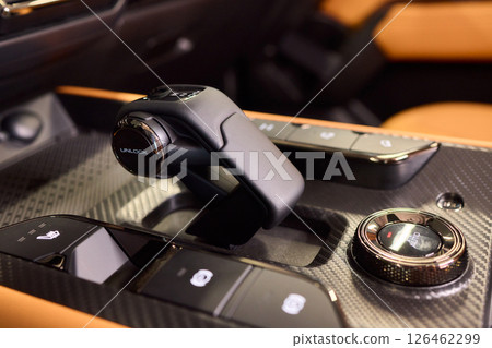 Macro shot of a car gear lever an essential auto part Macro shot of a car gear lever an essential auto part 126462299