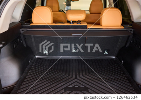 Modern SUVs have a stylish, spacious interior with foldable back seats and ample cargo space Modern SUVs have a stylish, spacious interior with foldable back seats and ample cargo space 126462534