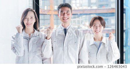 Field worker/engineer doing a fist pump Field worker/engineer doing a fist pump 126463043