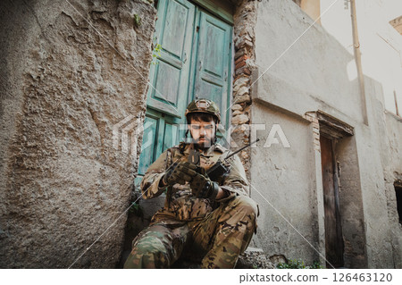Young Soldier In War Opens The Compass To Understand His Location 126463120