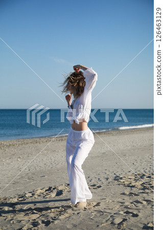 Calabria Dancer Girl On The Beach Near The Sea Calabria Dancer Girl On The Beach Near The Sea 126463129