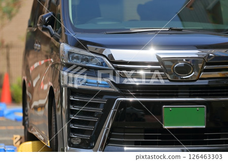 Parked black minivan Parked black minivan 126463303