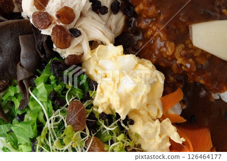 Close-up of colorful curry packed with nutritious vegetables Close-up of colorful curry packed with nutritious vegetables 126464177