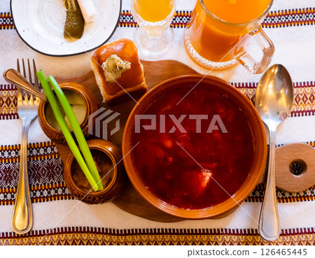 Russian borsch soup with meat and sour cream 126465445
