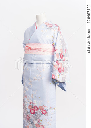 The process of dressing a mannequin in a formal kimono The process of dressing a mannequin in a formal kimono 126467133