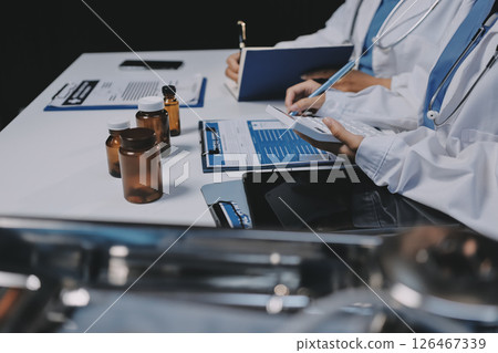 doctors and nurse having informal meeting in hospital canteen doctors and nurse having informal meeting in hospital canteen 126467339
