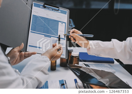 doctors and nurse having informal meeting in hospital canteen doctors and nurse having informal meeting in hospital canteen 126467353