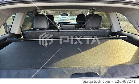 Car Interior View Spacious Trunk Area with Cargo Cover and Rear Seats for Travel Comfort Car Interior View Spacious Trunk Area with Cargo Cover and Rear Seats for Travel Comfort 126468271
