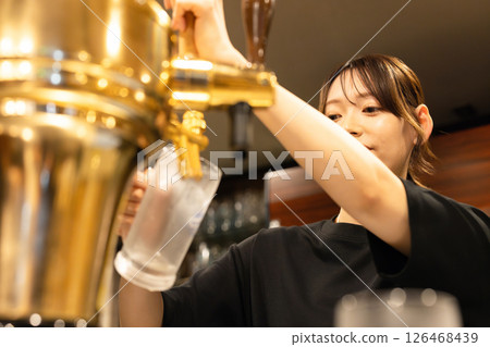 Female staff working at a restaurant 126468439
