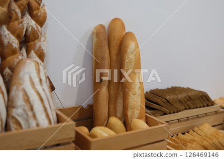 beautiful baked goods bread Multiple trays of baguettes fresh out of the oven at a commercial bakery in French Polynesia 126469146