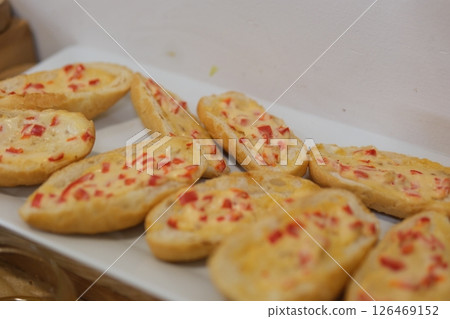 Close up of delicious snack cheese bread. Selective focus 126469152