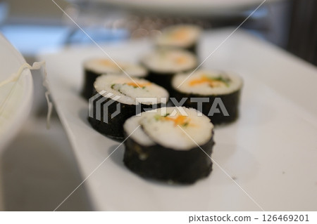Kimbap Korean Rolls Rice roll filled with carrot, sausage, radish and egg 126469201