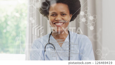 Image of data processing and chemical formula over biracial female doctor smiling Image of data processing and chemical formula over biracial female doctor smiling 126469419