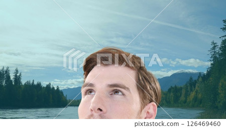 Image of caucasian man looking around over landscape Image of caucasian man looking around over landscape 126469460