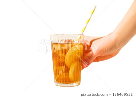 Person enjoys a cool glass of iced tea with lemon on a hot day, isolated on white Person enjoys a cool glass of iced tea with lemon on a hot day, isolated on white 126469531