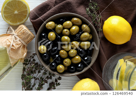 The concept of Italian cuisine, a plate with olives. The concept of Italian cuisine, a plate with olives. 126469540