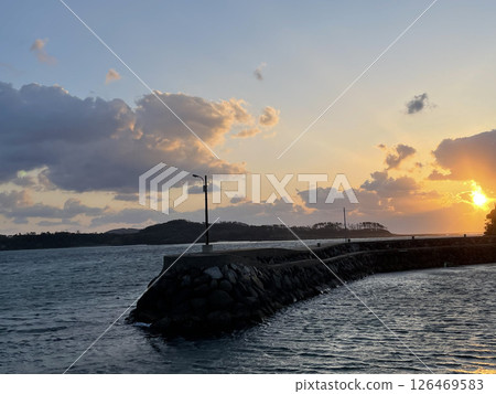 Orange sunset over the harbor 126469583