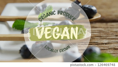 Image of organic produce vegan locally grown text over blueberries Image of organic produce vegan locally grown text over blueberries 126469748