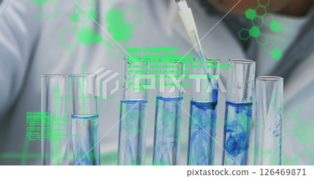 Image of scientific data processing over caucasian male scientist with test tubes in laboratory Image of scientific data processing over caucasian male scientist with test tubes in laboratory 126469871