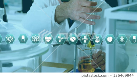 Image of medical icons over caucasian male scientists working at laboratory 126469944