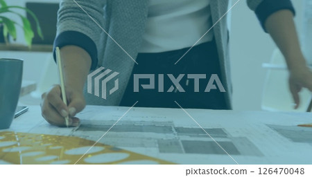 Image of african american businesswoman working in office 126470048