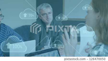 Image of clouds with growing numbers over diverse colleagues having meeting in office Image of clouds with growing numbers over diverse colleagues having meeting in office 126470050