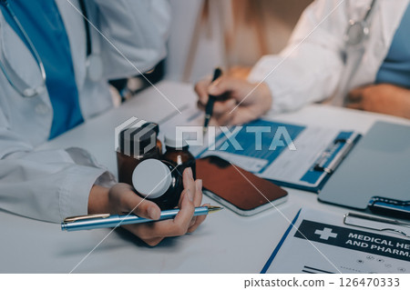 doctors and nurse having informal meeting in hospital canteen doctors and nurse having informal meeting in hospital canteen 126470333