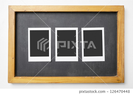 Three blank polaroid photo papers on the small blackboard on a white background. Mockup, template, or copy space. Instant camera photo print frame Three blank polaroid photo papers on the small blackboard on a white background. Mockup, template, or copy space. Instant camera photo print frame 126470448