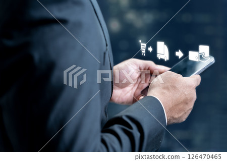 Businessman using a cellphone with ecommerce supply chain icon. Technology innovation on the virtual screen. Concept of industry, transport, and logistics Businessman using a cellphone with ecommerce supply chain icon. Technology innovation on the virtual screen. Concept of industry, transport, and logistics 126470465