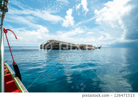 View of the island from the boat, rocks and islands during the day, summer travel 126471513