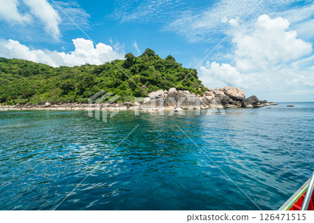 View of the island from the boat, rocks and islands during the day, summer travel 126471515
