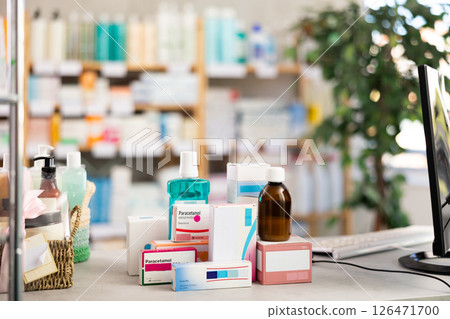 Close up of box with pills, tablets, ointments and health care products. Pharmacy, medical, retail shop and supply of health supplements, vitamins for vitality and wellness dispensary 126471700