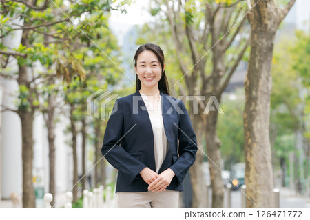 A woman in a suit A woman in a suit 126471772
