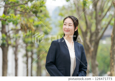 A woman in a suit A woman in a suit 126471773