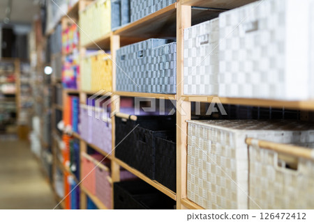 Storage boxes for sale in home furnishings store 126472412