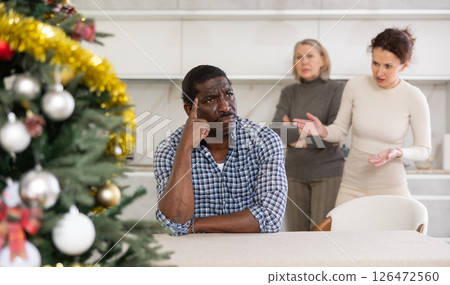 Adult woman and elderly woman quarreling with man 126472560