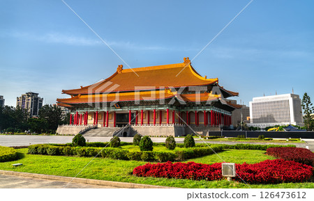 The National Theater in Taipei, Taiwan, is a grand traditional Chinese-style building located at Liberty Square, featuring a vivid orange roof, red columns, and intricate architectural details. 126473612